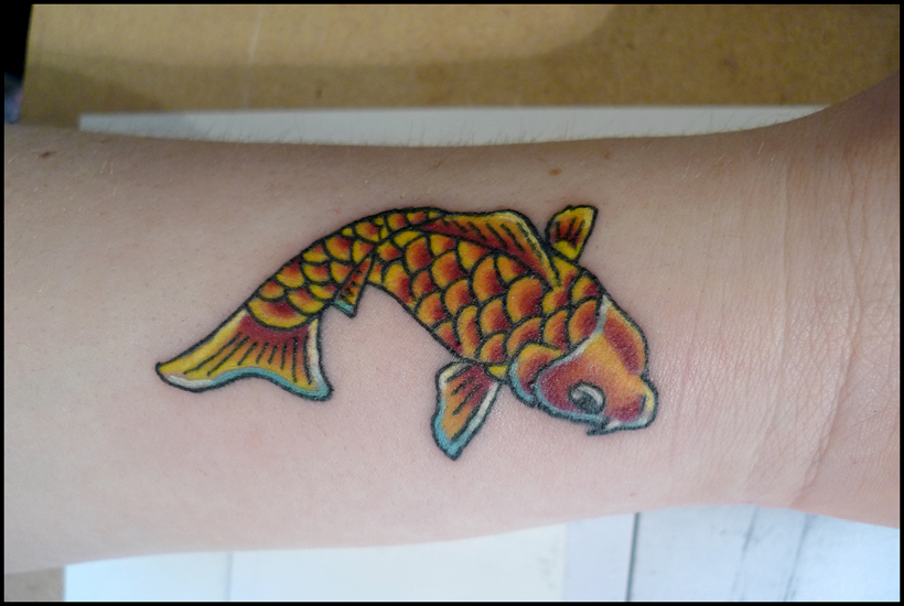 Tuesday May 18th (2010) Holly's new Tattoo width=