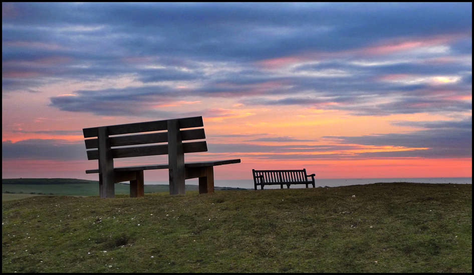 Wednesday February 15th (2012) Two benches, a sunset and the sea. width=