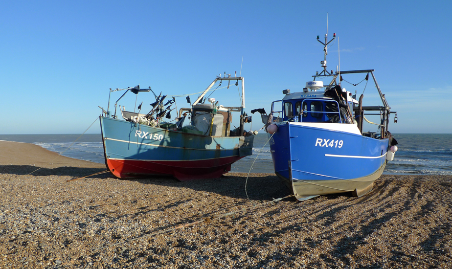 Friday March 6th (2015) Two fishing boats on the beach at Hastings. width=