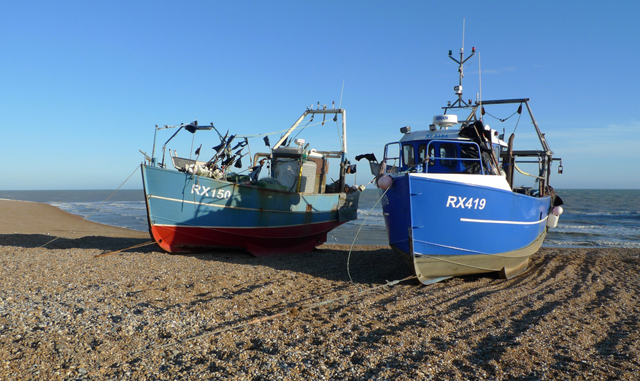 Friday March 6th (2015) Two fishing boats on the beach at Hastings. width=