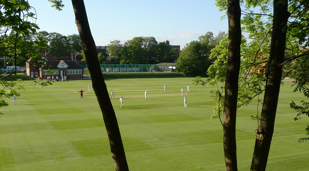Tuesday June 23rd (2015) The Umpire signals wide ball. width=