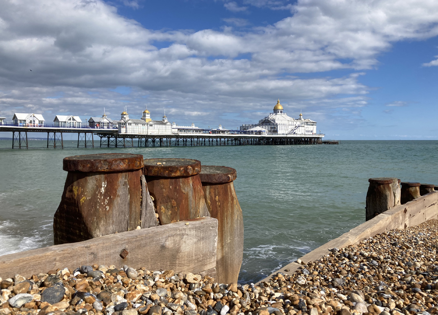 Tuesday March 28th (2023) Eastbourne Pier at high tide. width=
