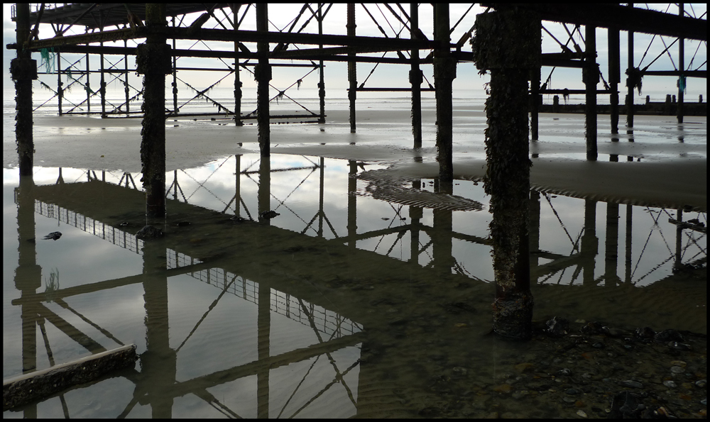 Saturday January 23rd (2010) Reflections under Bognor Regis Pier width=