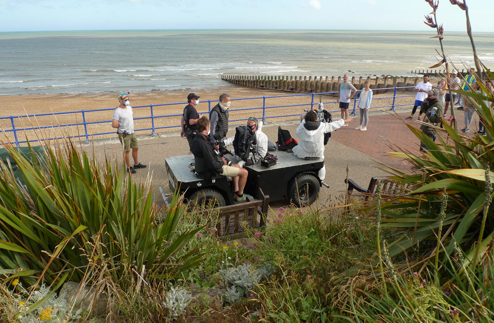 Thursday July 2nd (2020) Filming a group of joggers on Eastbourne promenade. width=