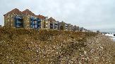 05: Damaged shingle bank ...